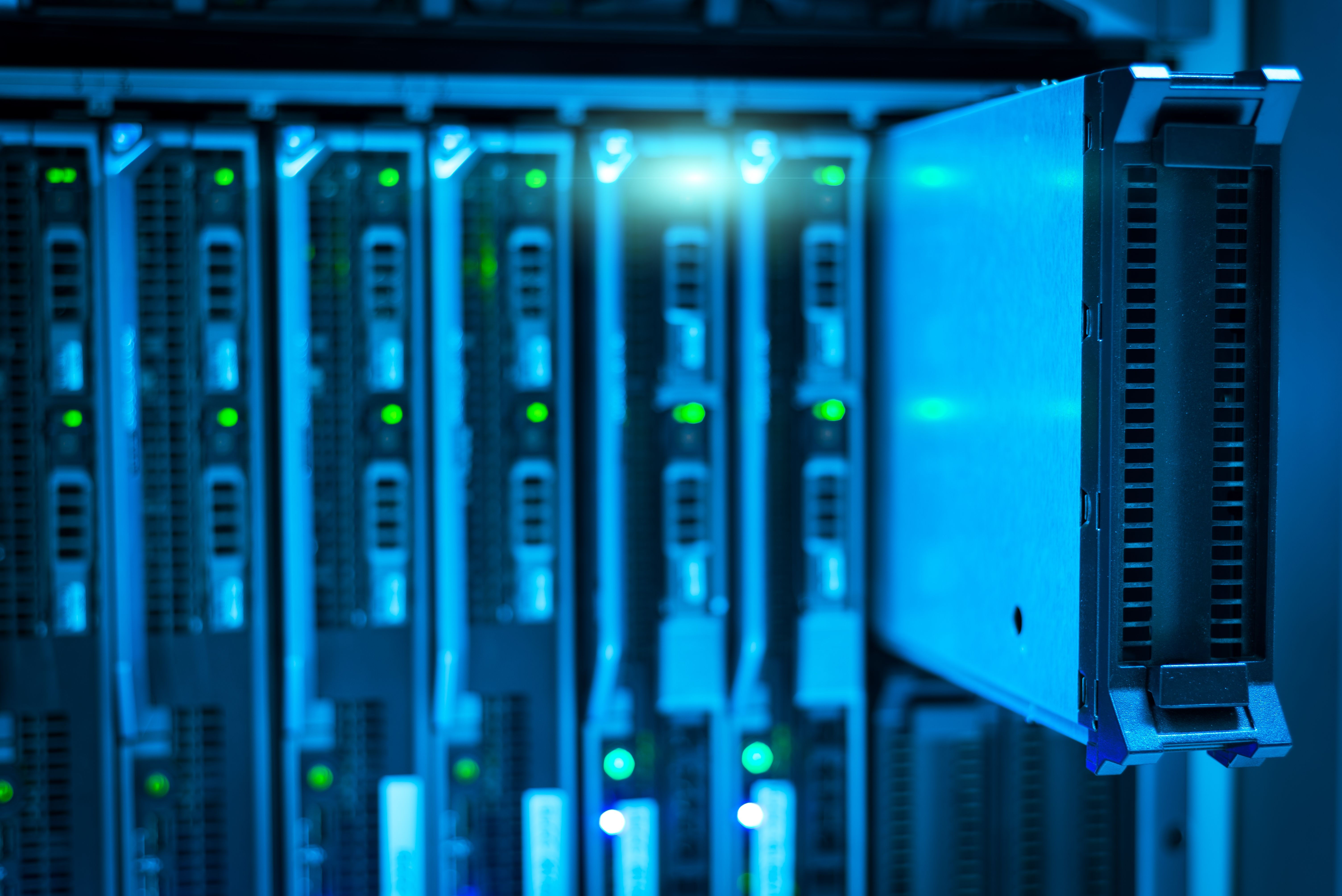 Modern cloud infrastructure with server racks and blue lighting